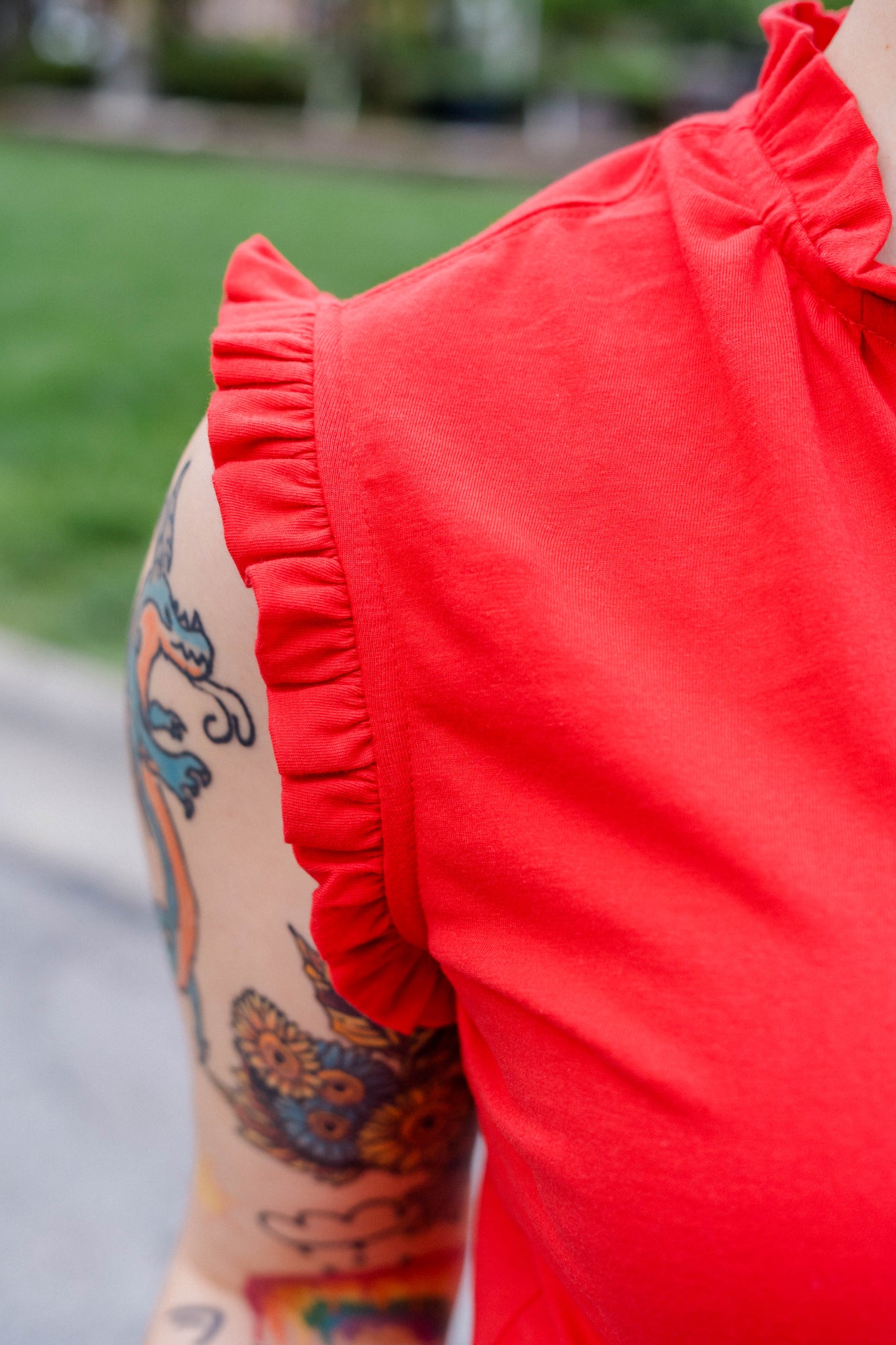 Sleeveless Ruffle Button-Up Shirt