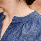 Elbow sleeve with frayed collar