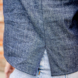 Elbow sleeve with frayed collar