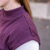 Sleeveless Tapered Mock Neck