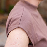 Sleeveless Tapered Mock Neck