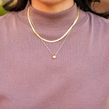 Sleeveless Tapered Mock Neck