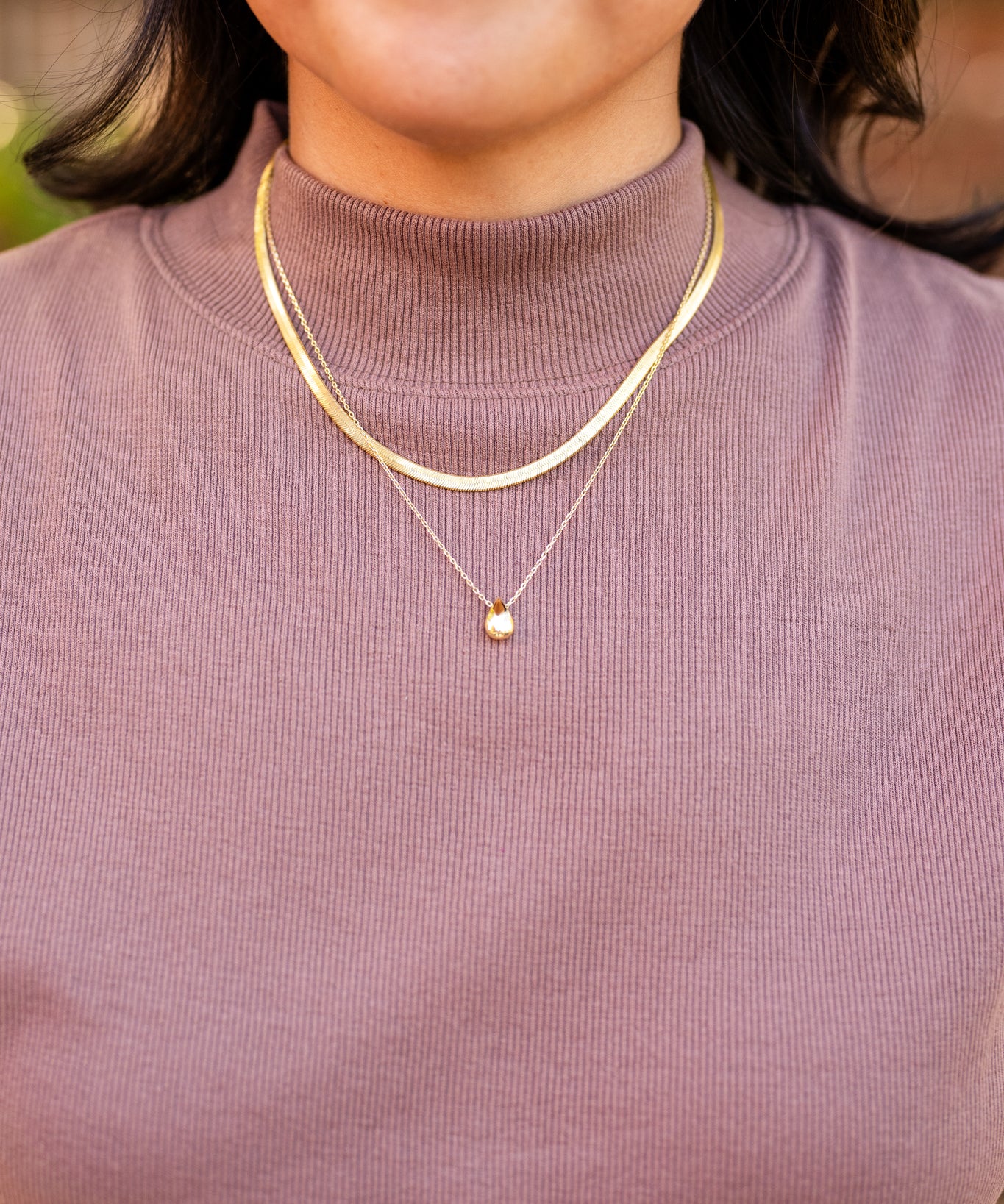 Sleeveless Tapered Mock Neck