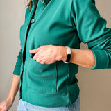 Versatile women's layering piece with a slightly boxy fit, crafted from soft 100% cotton surplus knit ribbed fabric. Features revised lower chest pockets, matching front buttons, and a stylish shirt collar. Medium-weight design hits at the waist or slightly below for a flattering fit.