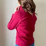 Versatile women's jacket with front pockets and a slightly boxy fit, crafted from soft 100% cotton surplus knit ribbed fabric. Features revised lower chest pockets, matching front buttons, and a stylish shirt collar. Medium-weight design hits at the waist or slightly below for a flattering fit.
