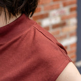 Sleeveless Tapered Mock Neck