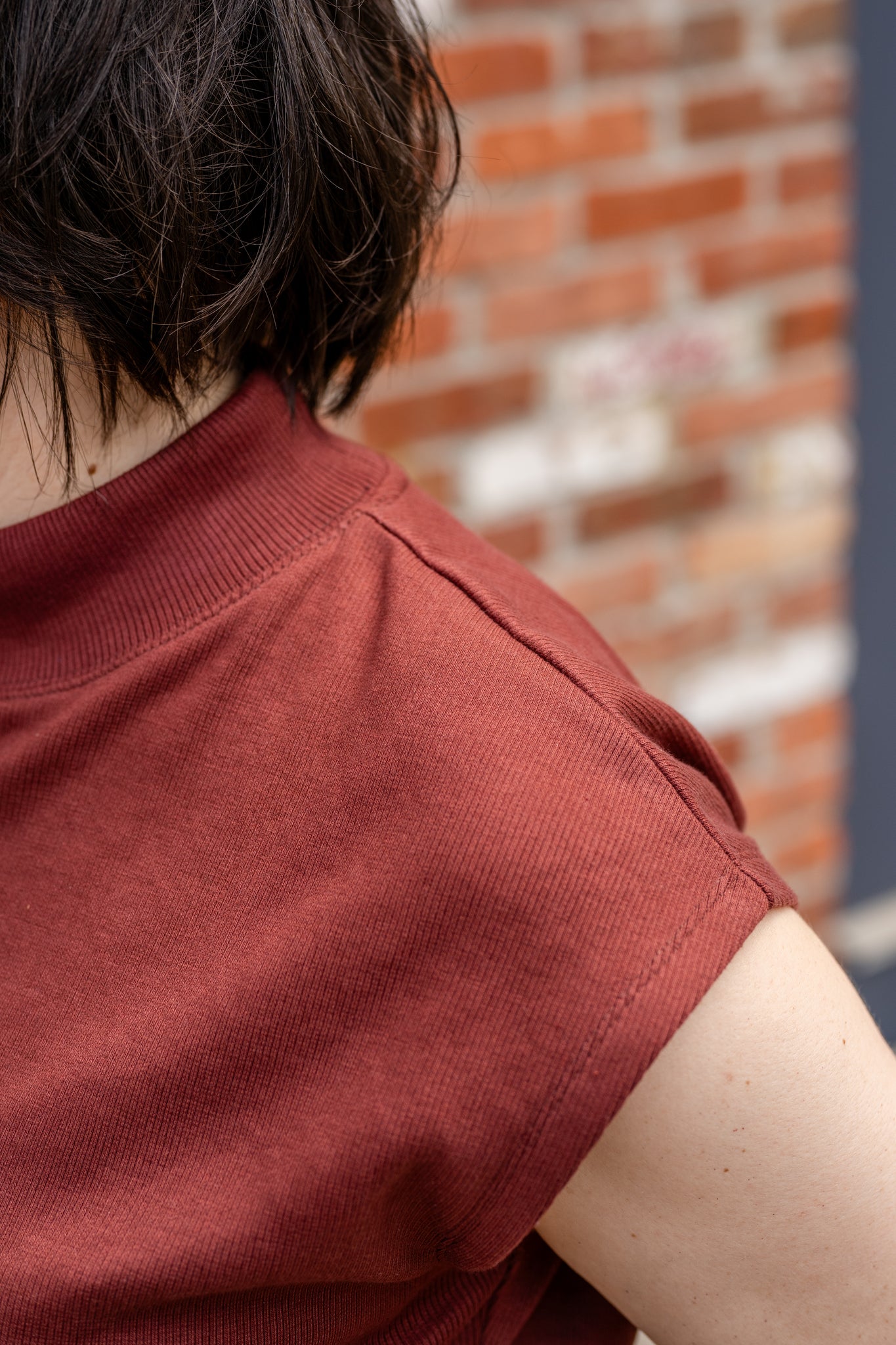 Sleeveless Tapered Mock Neck