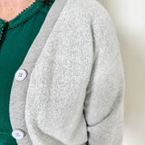 Women's button-front cardigan in lightweight knit fleece cotton blend, available in light grey. Features matching ribbed trims, classic fit, drop-shoulder long sleeves, banded hem & cuffs, and matching buttons. Light-medium weight fabric with slight stretch. Versatile styling. Available in XS-3X.