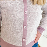 Women's button-front cardigan in lightweight knit fleece cotton blend, available in heathered lavender. Features matching ribbed trims, classic fit, drop-shoulder long sleeves, banded hem & cuffs, and matching buttons. Light-medium weight fabric with slight stretch. Versatile styling. Available in XS-3X.