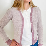 Women's knit blouse with lace detail, made from 100% cotton jersey surplus fabric. Available in white. Features a collarless band neckline, matching button-front placket, delicate knit lace on shoulders, collar, cuffs, and placket, keyhole buttoned cuffs, and side slits. Medium-weight fabric with light stretch for a straight fit. Available in sizes XS-3X. 