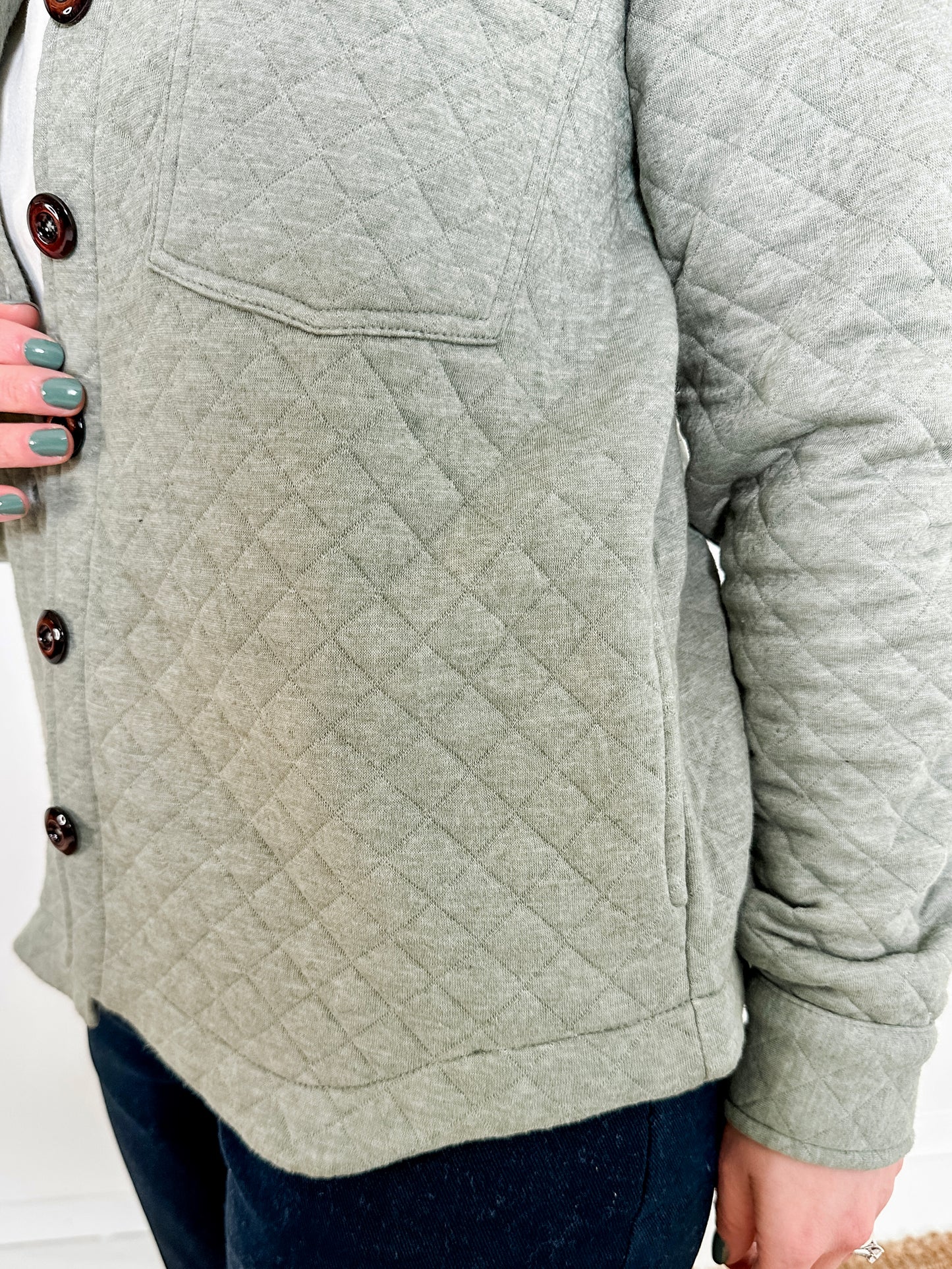 Women’s Quilted Knit Jacket – Sustainable Fashion – Made from Cotton Quilted Knit Leftover Fabrics – Light-Medium Weight with a Slight Stretch – Retro Resin Buttons – Shirt Collar with Button Front – Slightly Below Hip Length with Curved Hem – Long Sleeves with Cuff, Keyhole, and Button Closure – Functional Design with 2 Front Pockets and 2 Side Pockets.